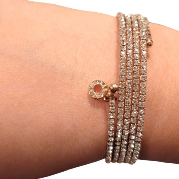 Anne Klein Multi-Row Crystal Coil Rose Gold Bracelet - Picture 3 of 13